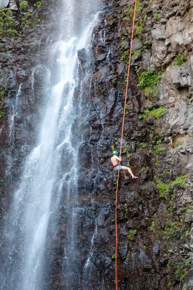 adventurous-canyoning-down-a-majestic-waterfall